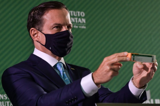 The governor of Sao Paulo shows a dose of the Chinese vaccine CoronaVac during a press conference, January 7, 2021 in Sao Paulo
